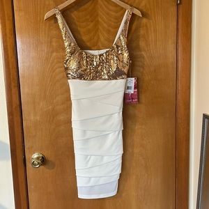 Never worn evening dress with gold sequence size medium